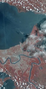 In this portion of a July 21, 2002 scan of New Orleans, the image has been color-processed to reflect data collected from multiple bands, including infrared, which shows up as the bright red. (Image: NASA)